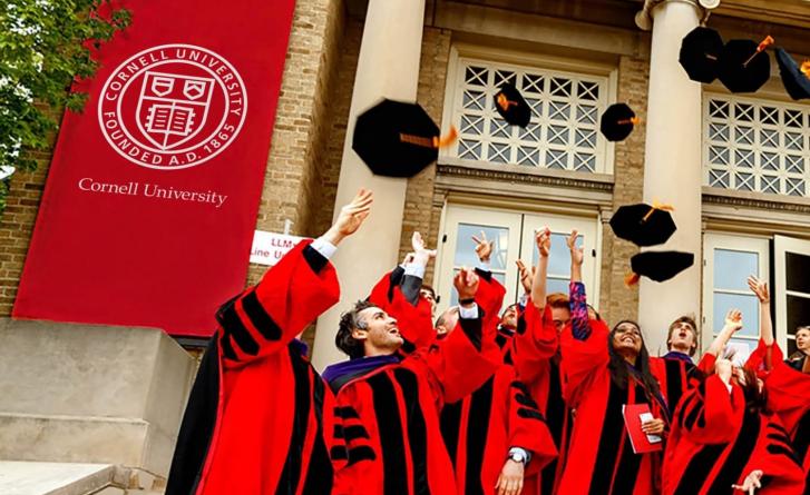 Graduates throwing up their graduation caps